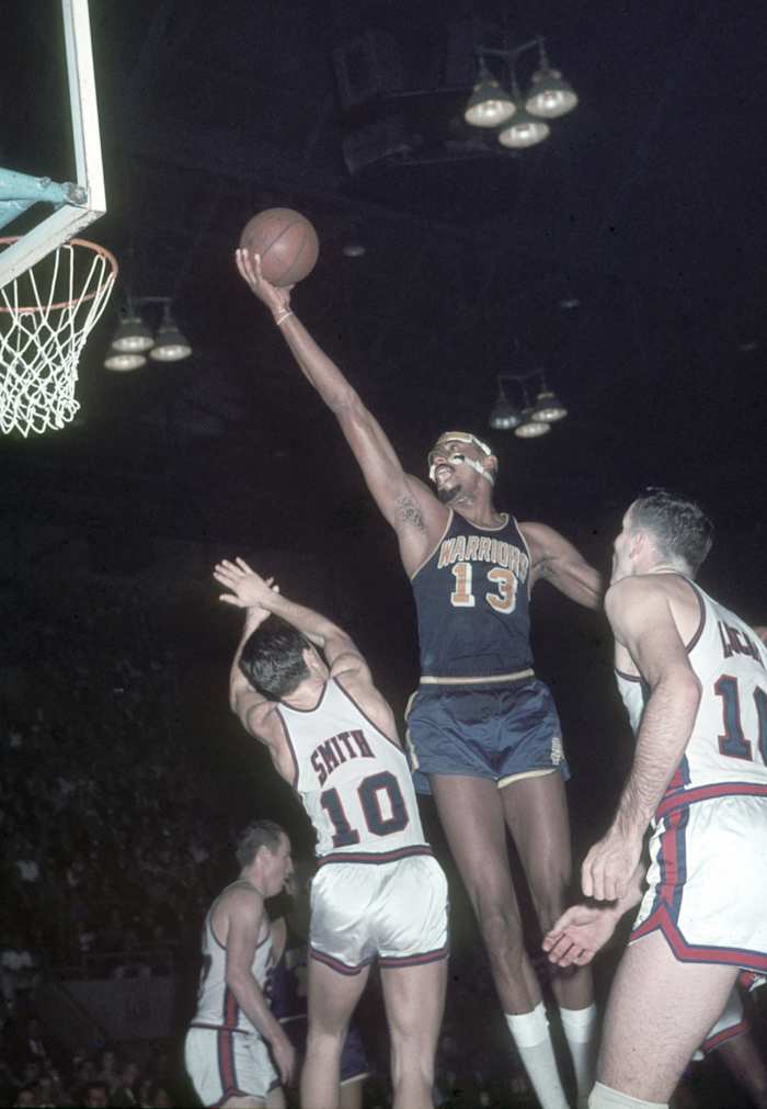 Unknown date; Cincinnati, OH, USA; FILE PHOTO; San Francisco Warriors center Wilt Chamberlain (13) in action against the Cincinnati Royals at Cincinnati Gardens.